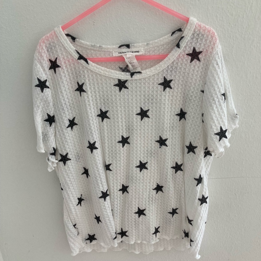 Black and white, star pattern top. From Caution To The Wind, size Small